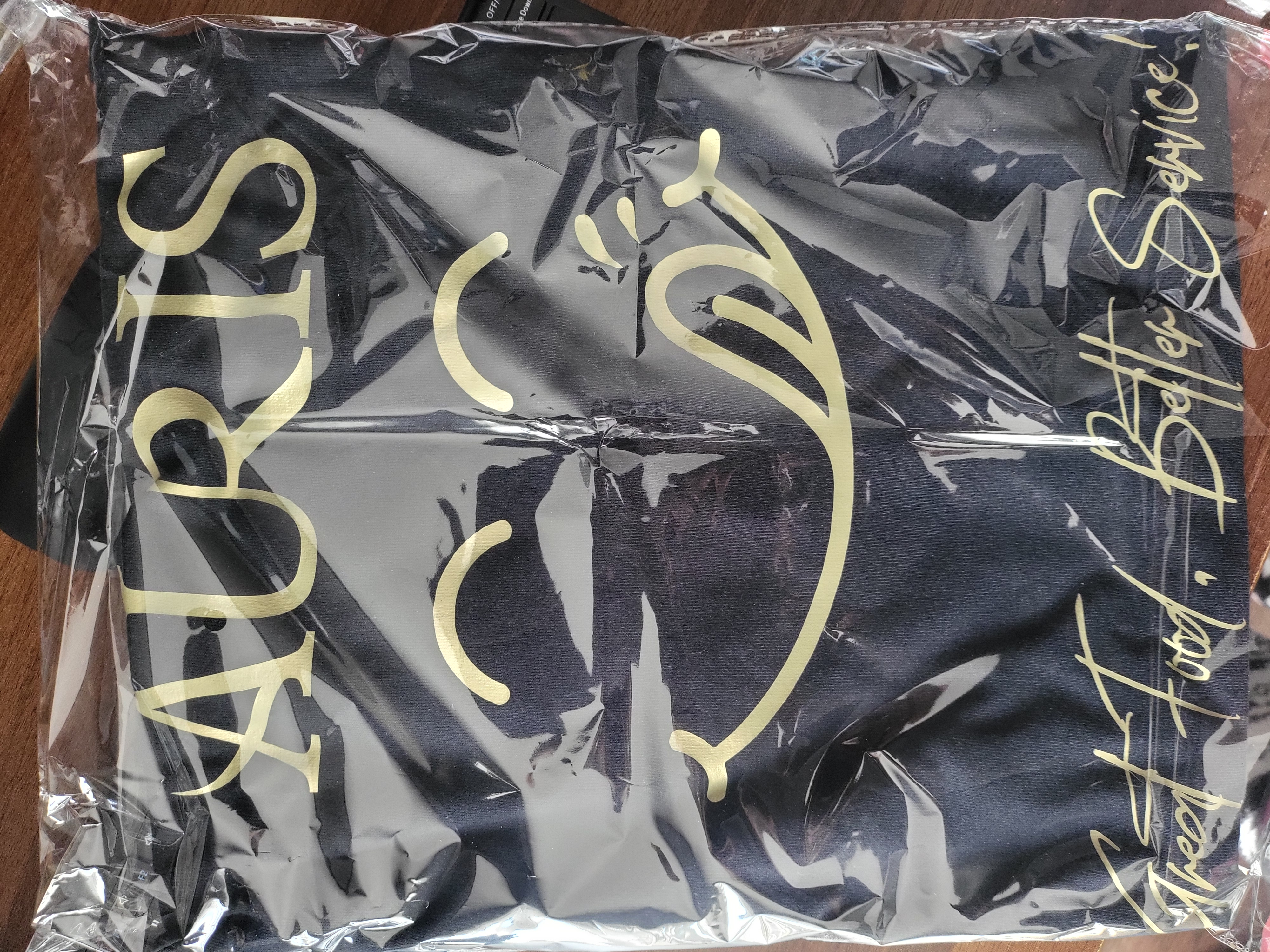 Auris restaurant T-shirt packed